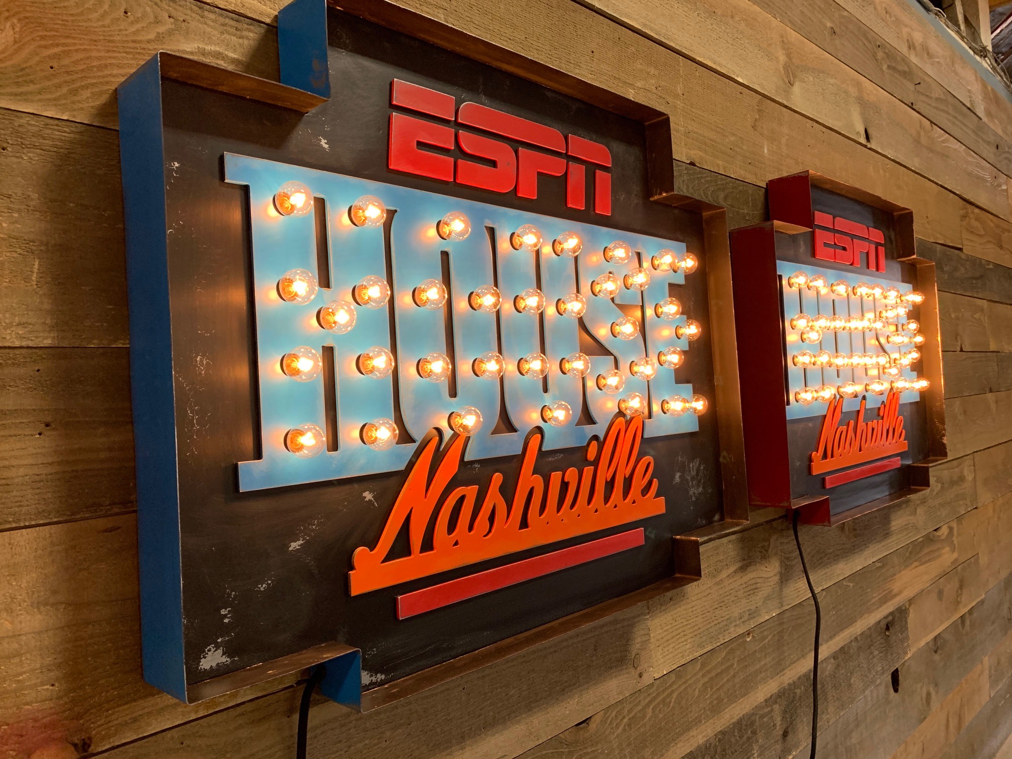 ESPN House Nashville dimensional sign with lit marquee letters on a wood wall