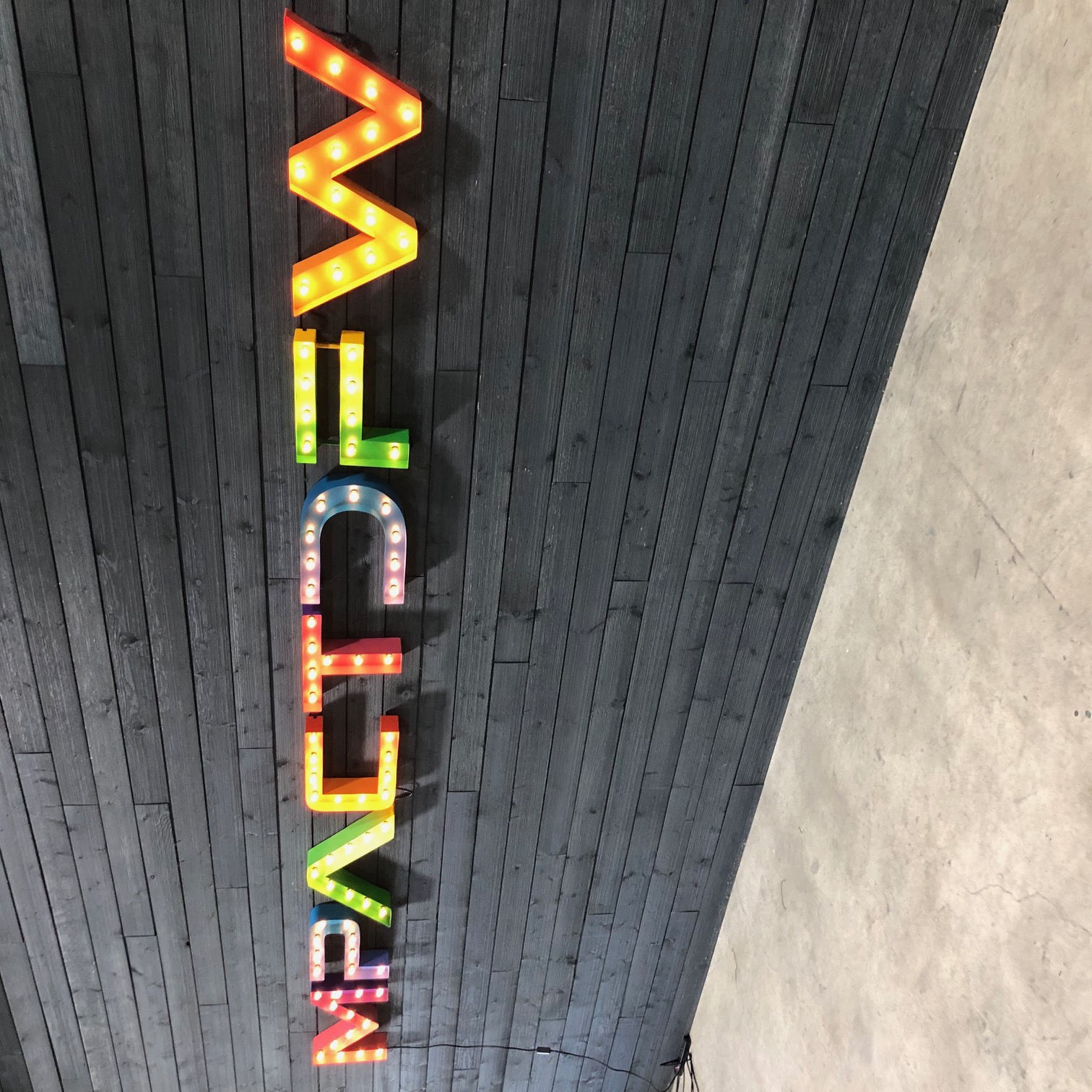 Vintage steel marquee letters in a retail storefront