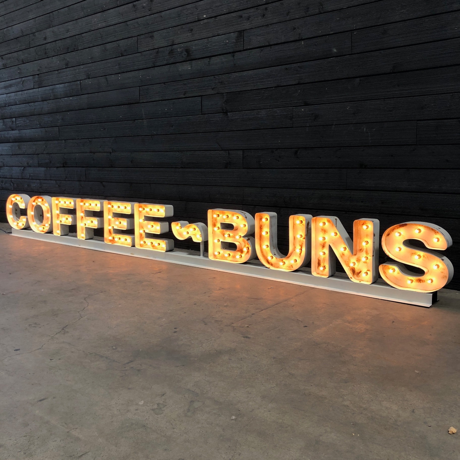 Coffee & Buns illuminated marquee letters
