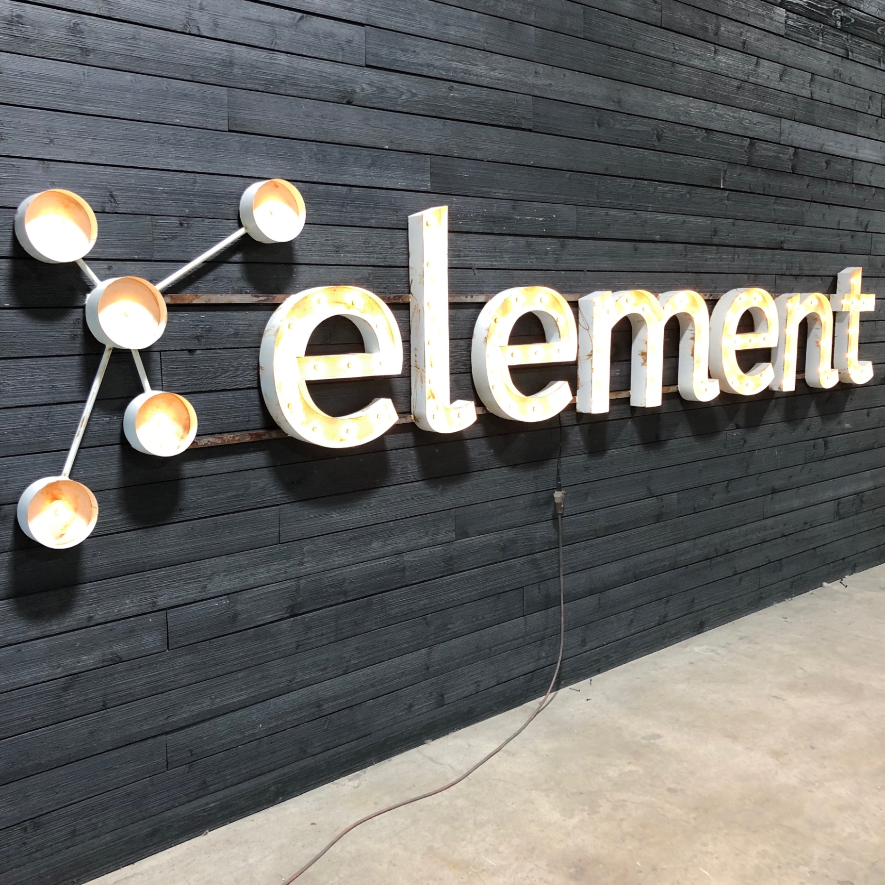 Script lighted letters mounted in cafe